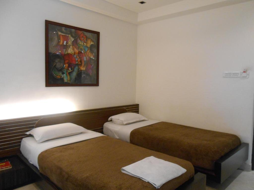 Hotel Victerrace Regency Kolkata Phòng bức ảnh